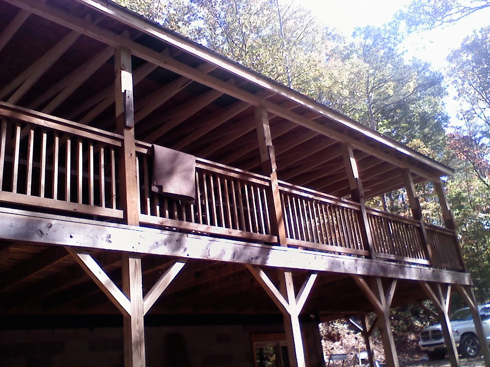 Timber framing under a new elevated porch and deck — Roof Leak Repair in Becker by Roofing Brothers